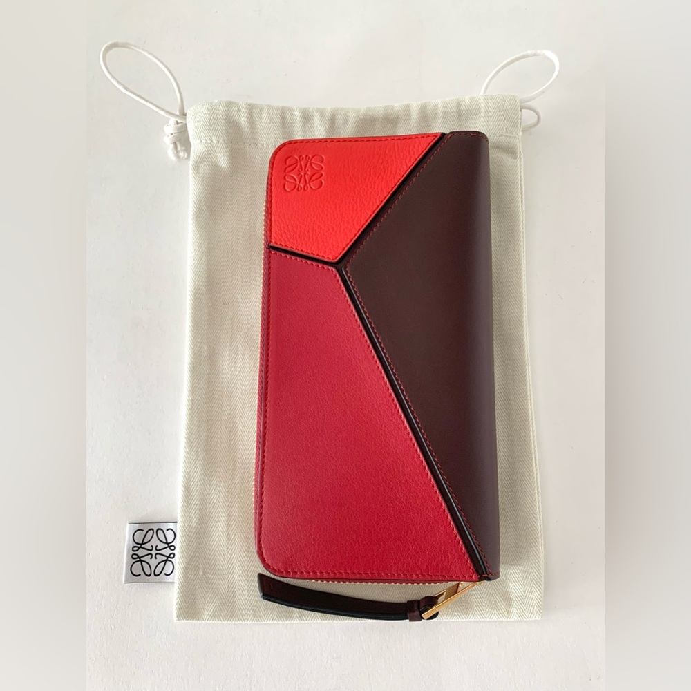 Loewe zip around wallet and storage bag, NWT.